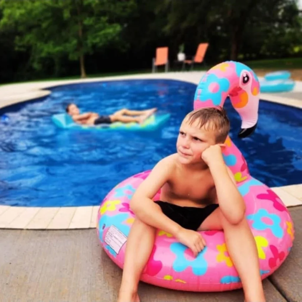 Boy On Flamingo Float 1024